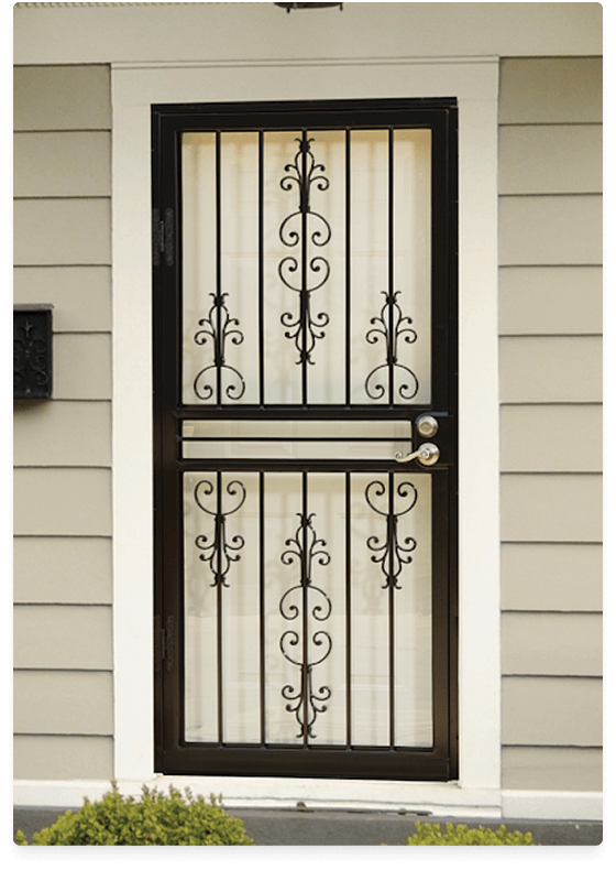 black-decorative-scroll-security-screen-door-grey-siding-home Black wrought iron security screen door with decorative scroll design installed on a residential home with grey siding