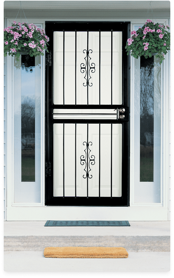 black-ornamental-scroll-security-screen-door-white-front-entrance Black steel security screen door with ornamental scroll bars mounted on a white front entrance with hanging pink flower baskets