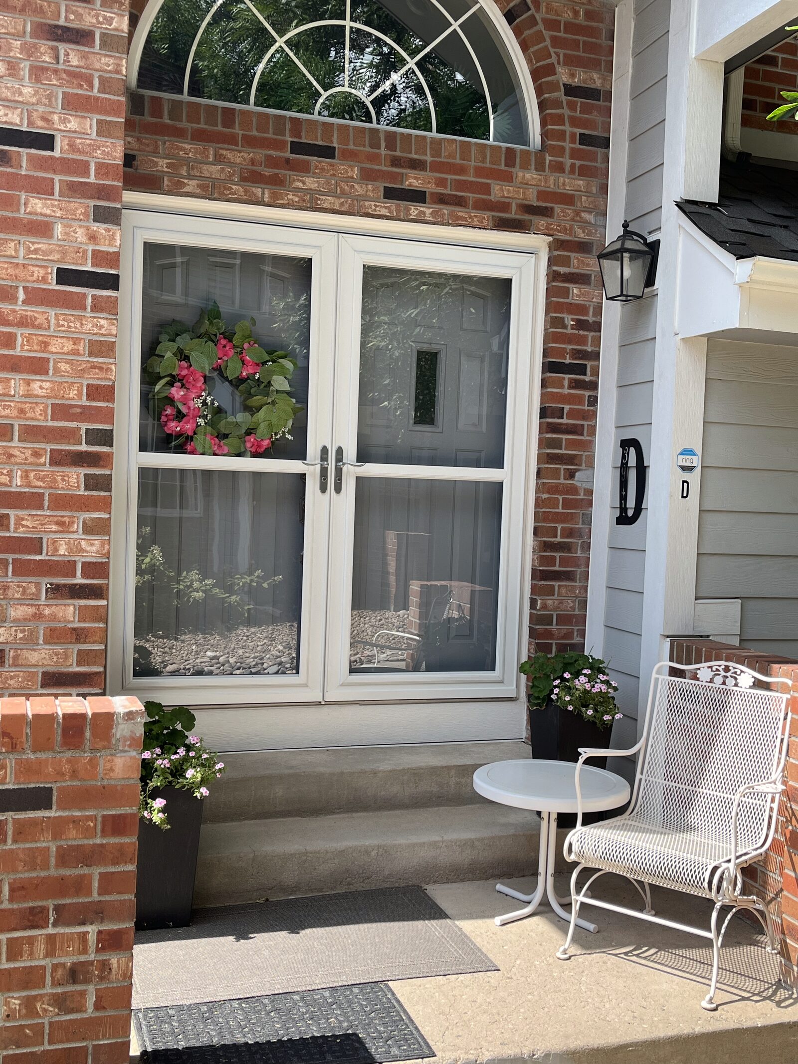 white-double-french-storm-doors-brick-entry French doors denver colorado